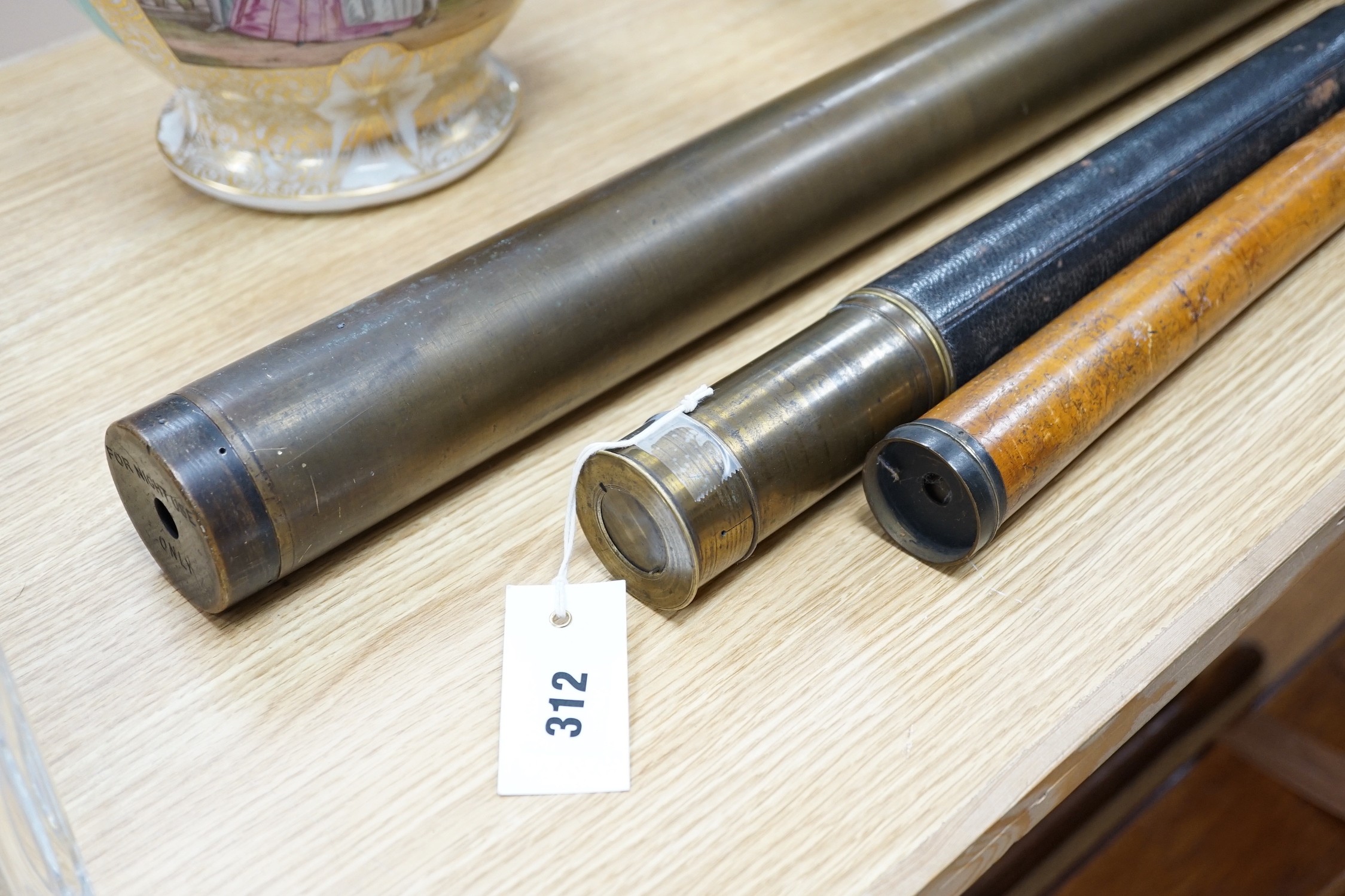 Three telescopes including a Ross, London No. 51257, largest 67.5cm
